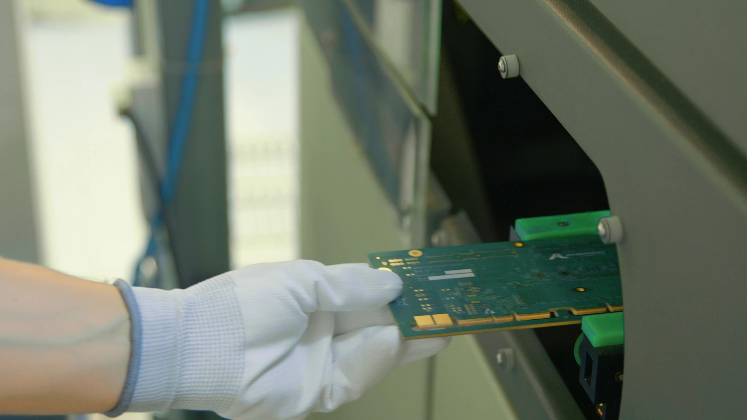 Circuit board under testing at an electronics quality control workstation